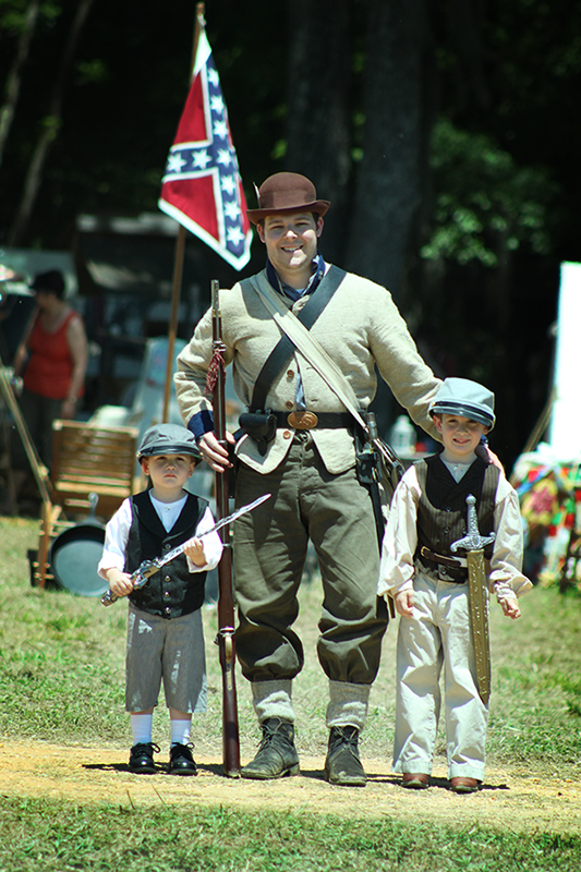 Our Boys Pose with a “Real” Confederate Soldier 