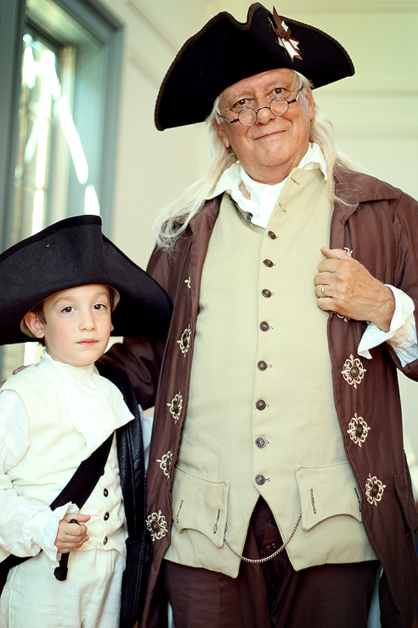 Calvin and Benjamin Franklin after his demonstration on electricity